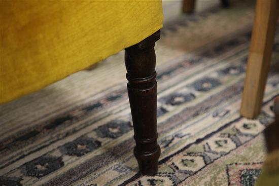 A George III wing armchair